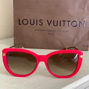 Louis Vuitton red acetate frame sunglasses.